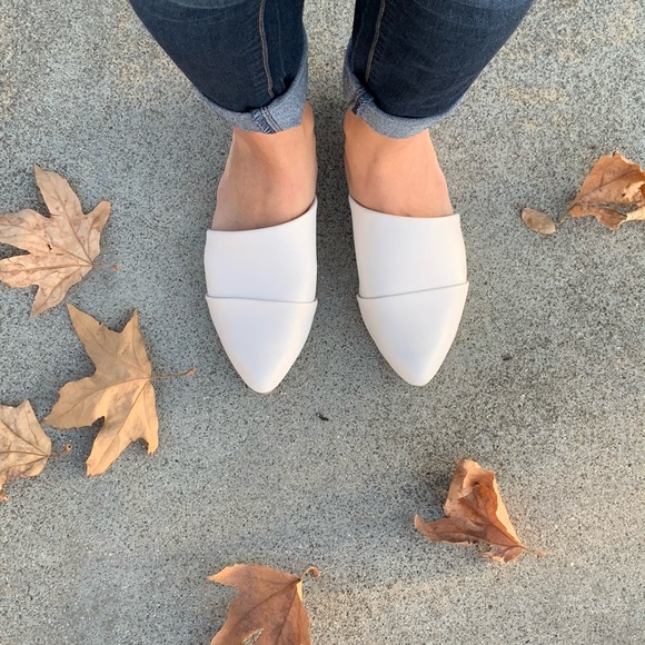Shoes - Off White faux leather pointy toe slip on mules